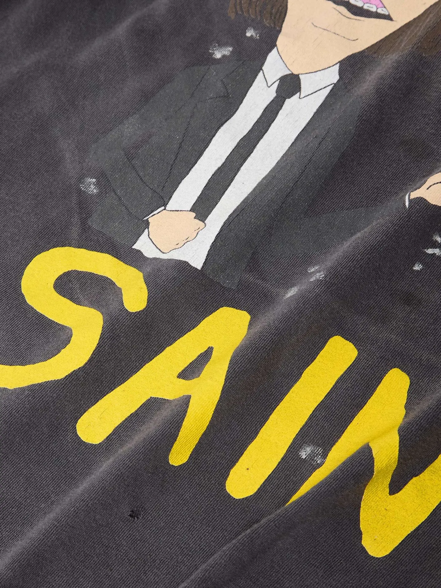 SAINT Mxxxxxx RAPTURE SS TEE/BLK Beavis and Butt-Head anime character TEE. Washed black S-XL. The print is from the characters of the American classic animation "Beavis and Butt-Head". It also pays tribute to the two classic killer characters in "Pulp Fiction". It is very witty and humorous. The whole garment is washed again.
